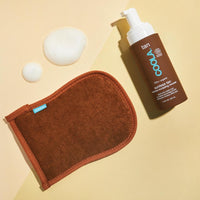 Coola - Gant exfoliant et applicateur 2 en 1